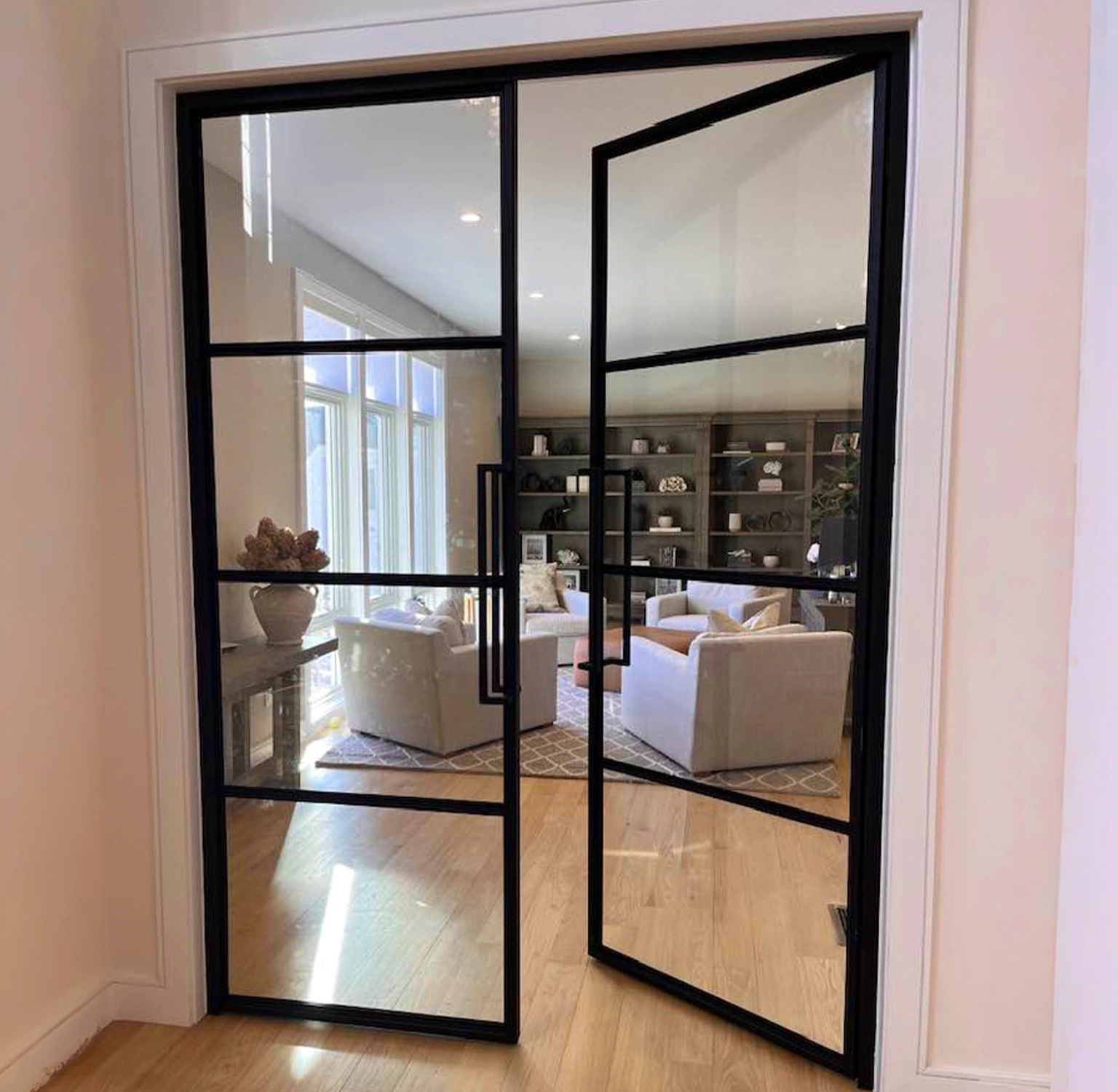 Custom Metal Door way leads to inviting furnished study